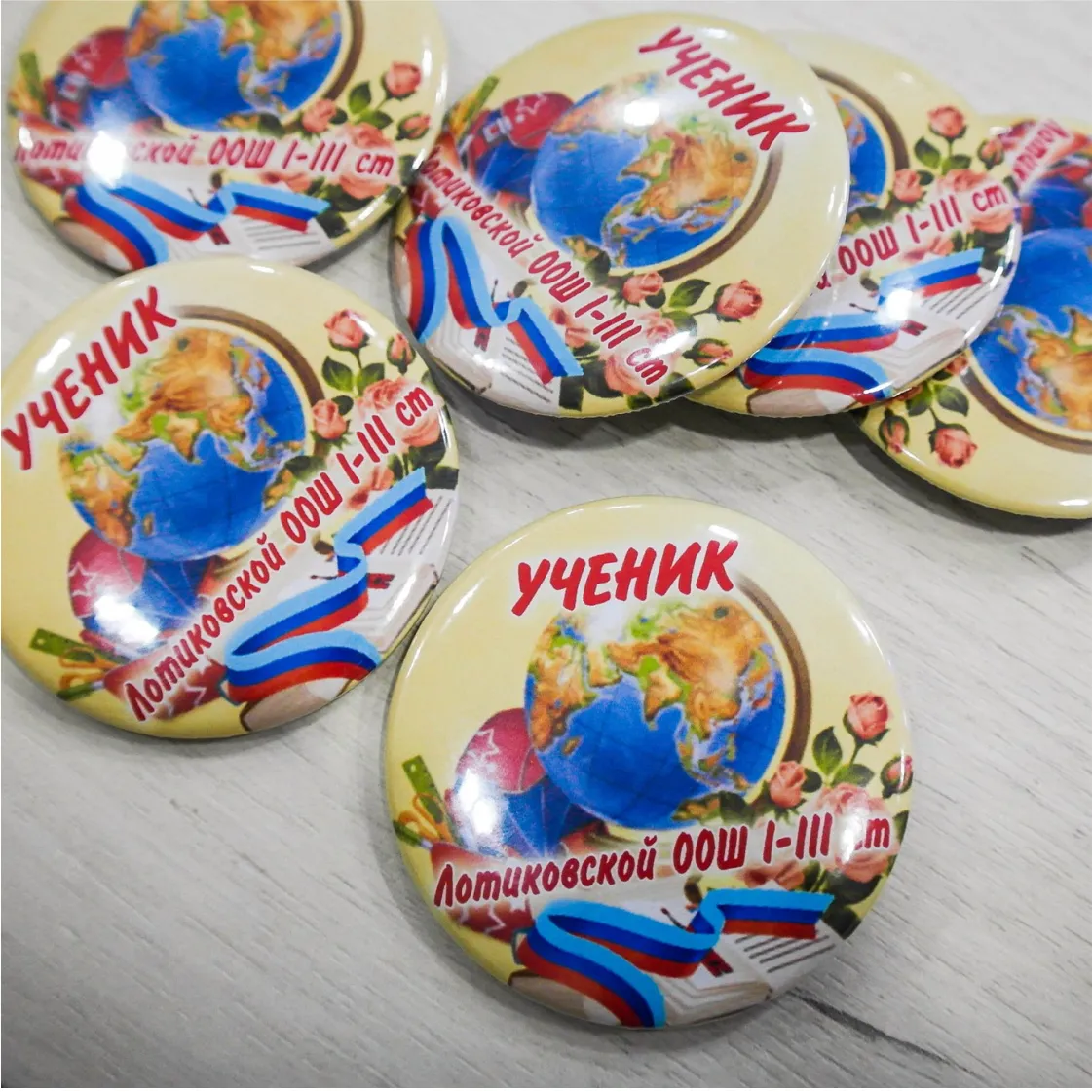 Заказать печать на значках 58 мм