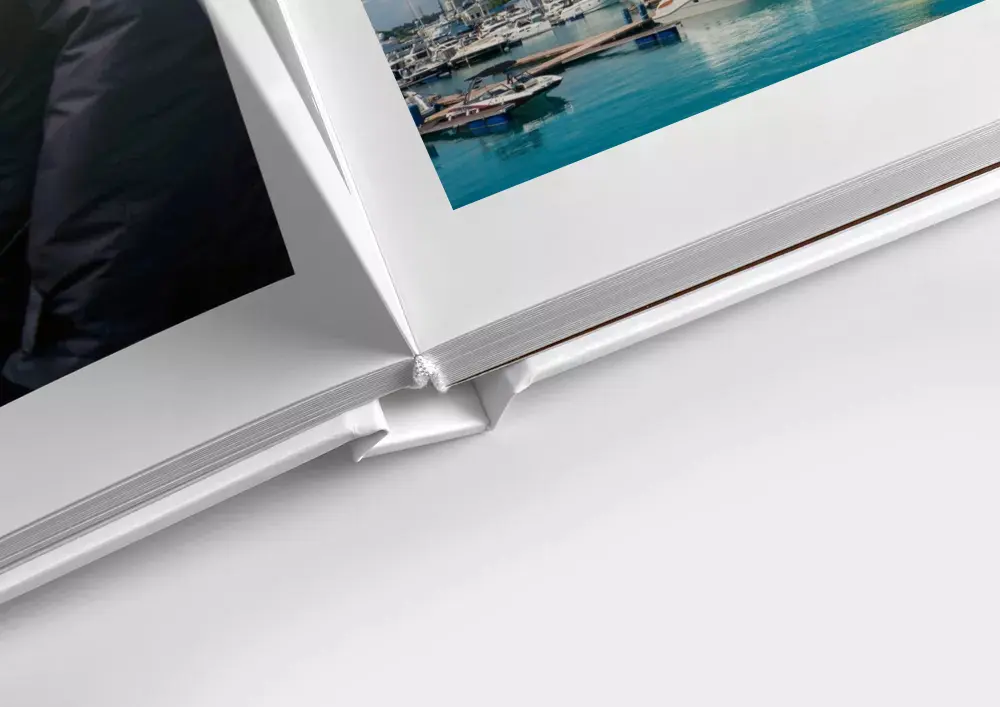 Фотокнига 20×20 см с персональной фотообложкой